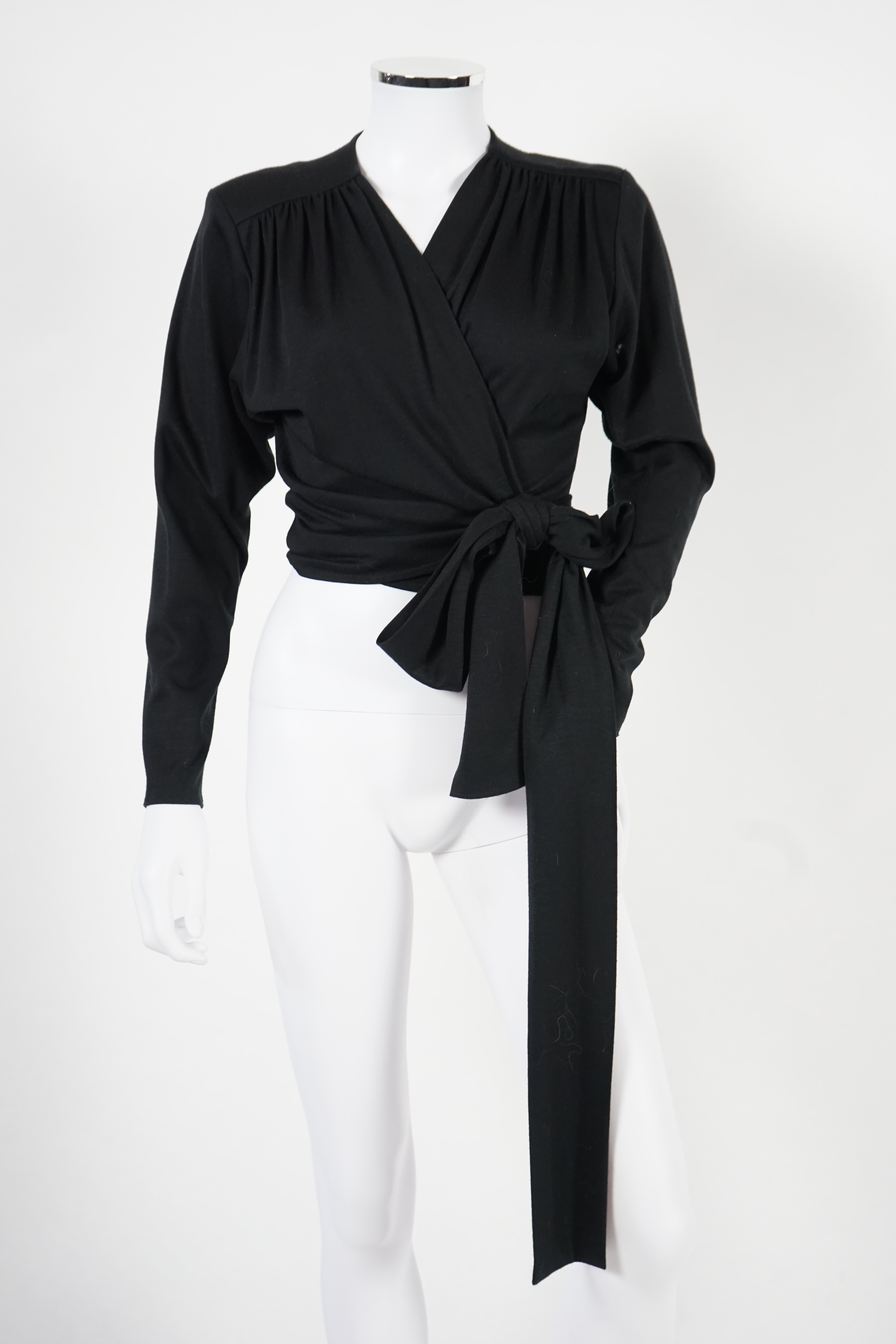 Four vintage Yves Saint Laurent variation lady's tops, F 40 (UK 12).Proceeds to Happy Paws Puppy Rescue